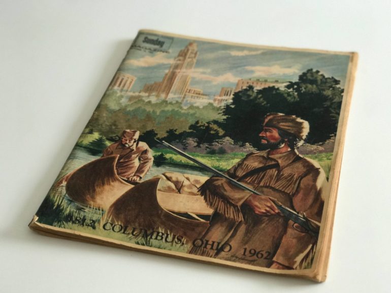This Old Issue Of The Columbus Dispatch Shows The City's Hopes For The Future 6 Vintage 1967 book cover featuring two men in a canoe with historic cityscape in background.
