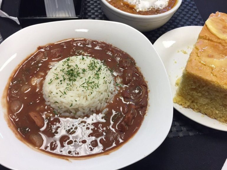 Red beans and rice with sausage at Way Down Yonder, with cornbread and side stew