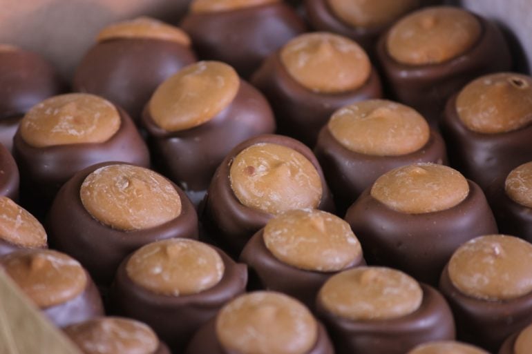 Buckeye candies from The Buckeye Chocolate Company piled in a bin