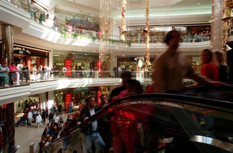8 Things That Definitely Mean You Were A 1990s Columbus Kid 4 City Center Mall interior with escalators, holiday decorations, and shoppers