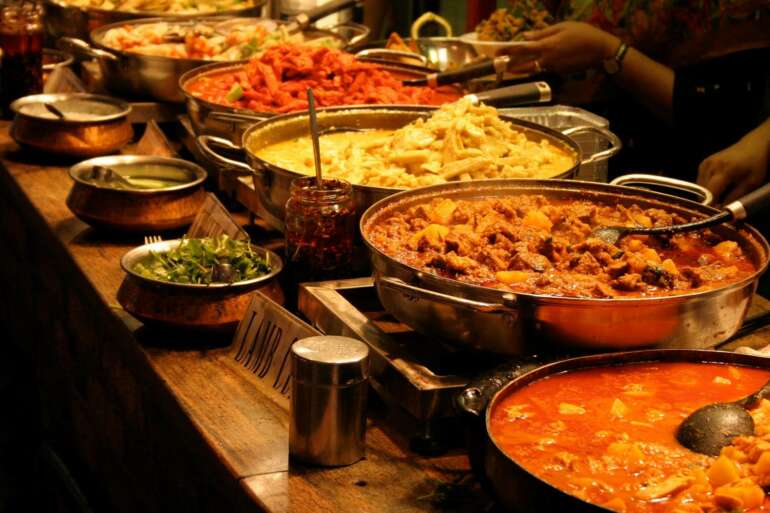 The Best Buffets In (And Around) Columbus 1 Buffet steam pans of Indian curries and dishes at Cumin and Curry Indian Kitchen