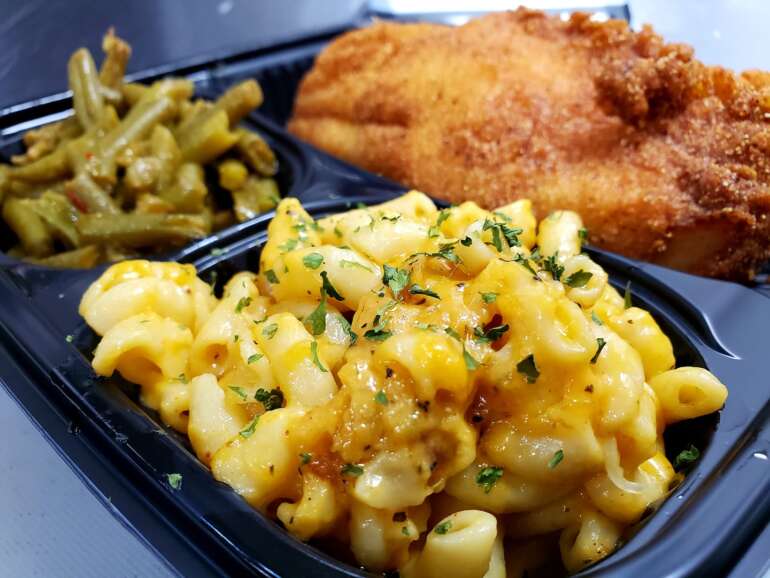 The 6 Best Spots For Soul Food In Columbus 3 Fried catfish with mac and cheese and green beans in takeout container