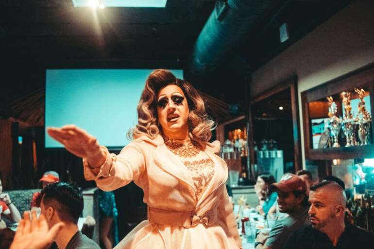 The Best Places To Catch A Drag Show In Columbus 9 Drag performer in pink gown entertains crowd at Union Cafe drag brunch