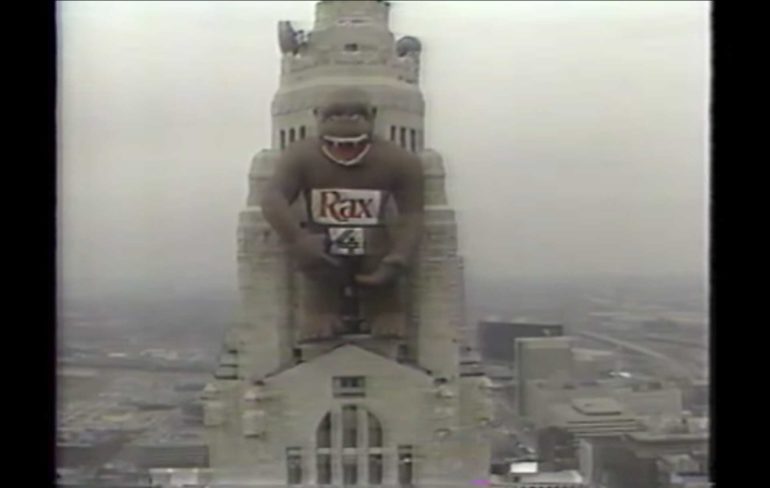 That Time In 1988 When A Massive Inflatable Gorilla Was Strapped To The LeVeque Tower 1 Inflatable gorilla wearing a Rax sign strapped atop the LeVeque Tower in this archival photo