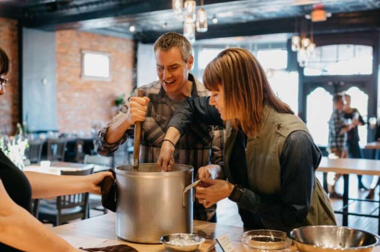 Mixing something up at The Kitchen participatory dining