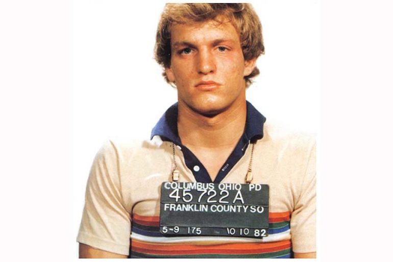 19 Random Facts About Columbus Guaranteed To Make You Say "Whoa, Wait!" 10 Mugshot of male suspect holding Columbus Ohio Police Department identification placard from 1982.