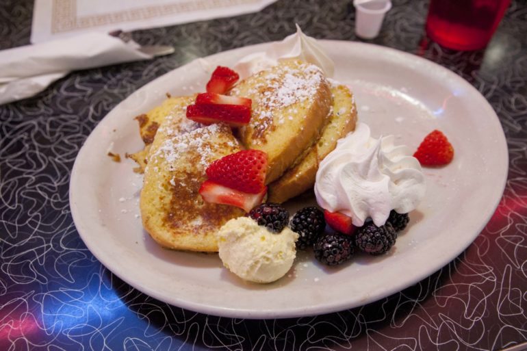 Where To Find The Most Delicious French Toast Around Columbus 4 French toast piled with strawberries and blackberries at Tommy's Diner