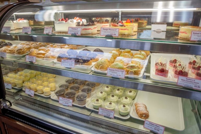 'Food & Wine' Says We're One Of The Best Cities For Bakeries In U.S. 5 Pastry case at Belle's Bread with cakes, cream puffs, and mousse cups