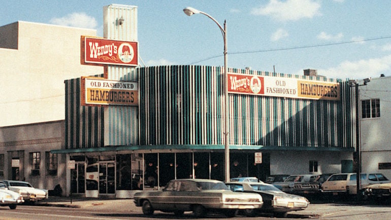 These Nostalgic Columbus Chain Restaurants Will Take You Back In Time 5 The original Wendy's with striped facade and classic cars out front, vintage view