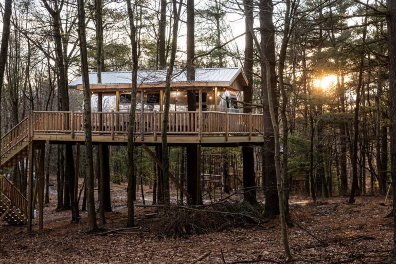 This Treehouse Is Actually An Elevated Airstream Trailer, 25 Feet Off The Ground 8 Silver Bullet 11