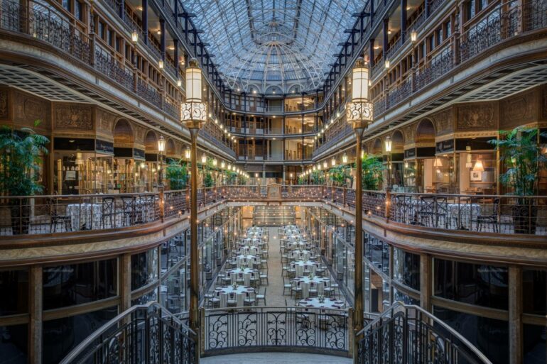 Historic Cleveland Arcade atrium with glass skylight roof and tiered balconies