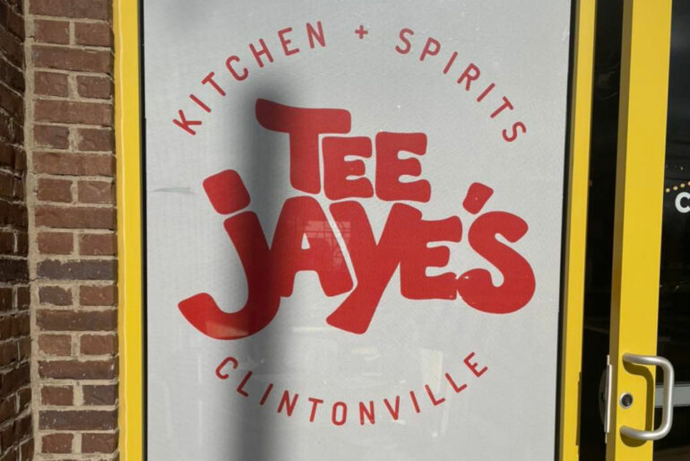 Tee Jaye's Is Returning To Clintonville Later This Month...With Booze 8 Red and white signage for "Tee Jayes" kitchen and spirits restaurant on brick building.