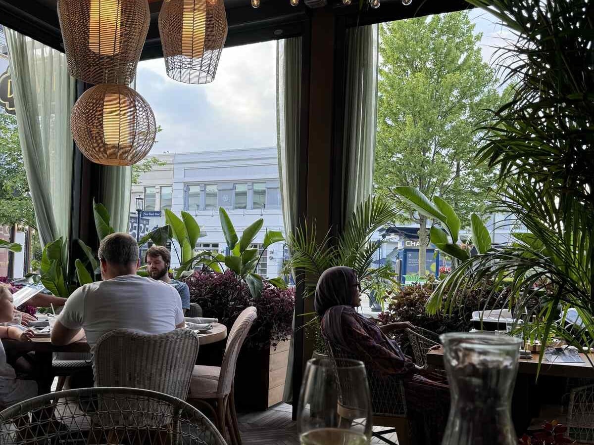 The 10 Most Beautiful Restaurants In Columbus 7 Del Mar Easton terrace with woven pendant lamps, tropical plants and open windows
