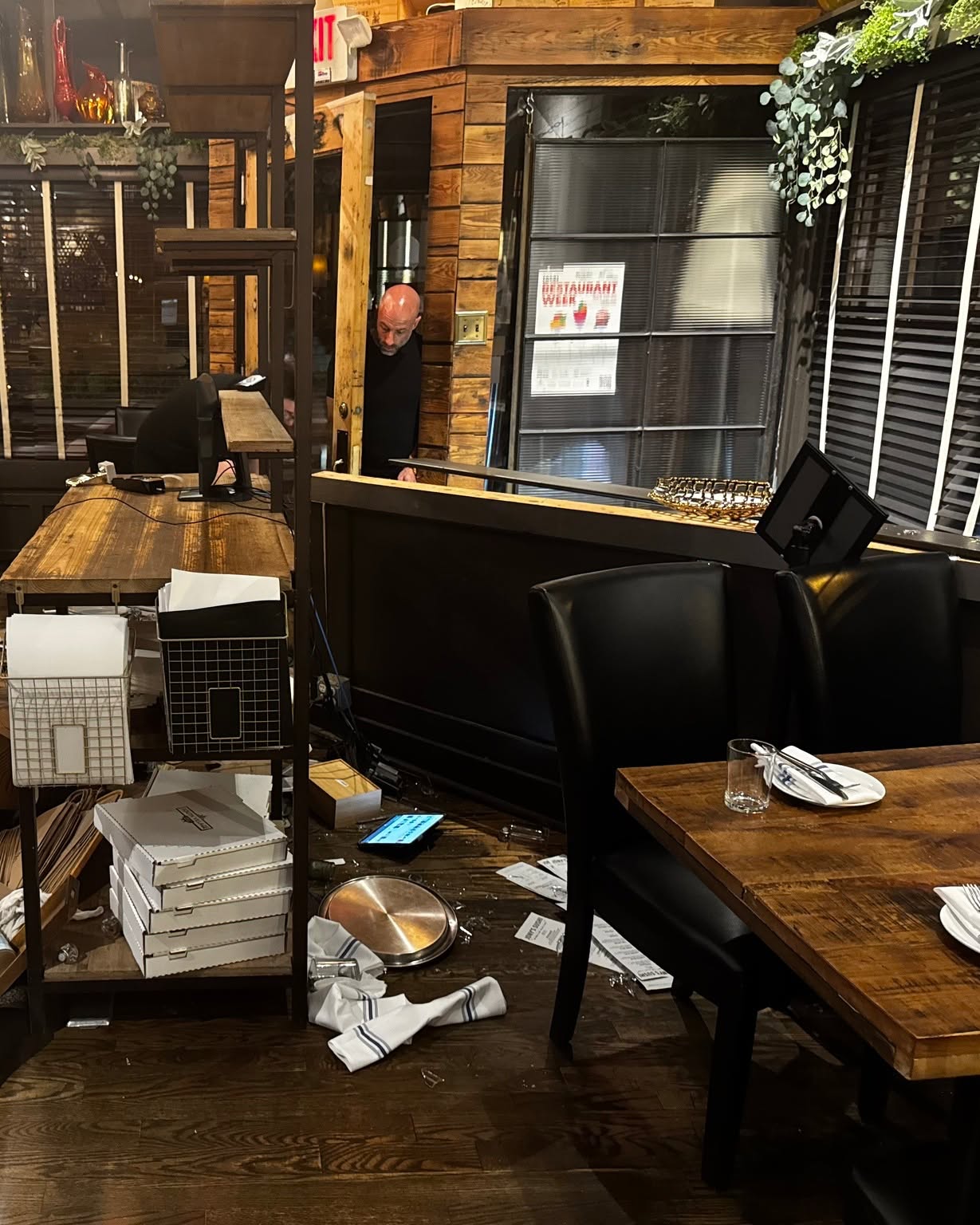 South Village Grille Gets All-Clear After Vehicle Crashes Into Building 2 debris scattered through restaurant after car crash