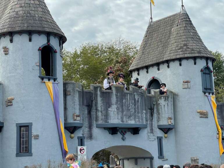 Costumed performers on castle ramparts at the Ohio Renaissance Festival