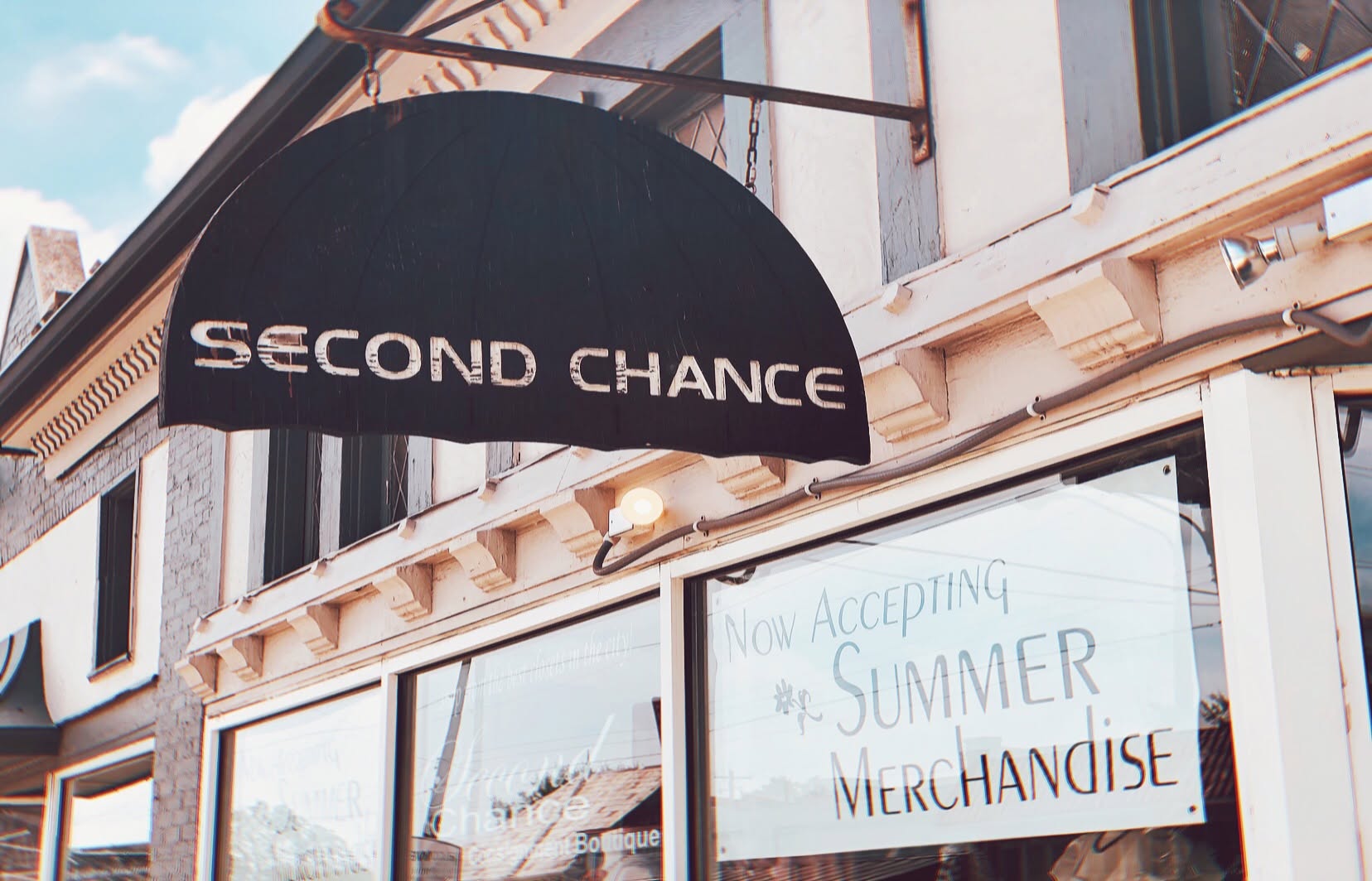 A Guide To High-End Consignment Shops In Columbus 1 hanging sign outside of second chance consignement