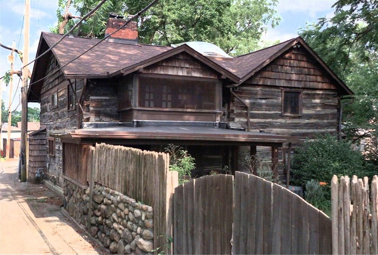 wooden pioneer era cabin on OSU campus