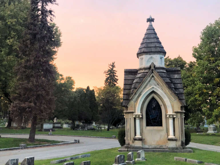 a mausoleum at sunset