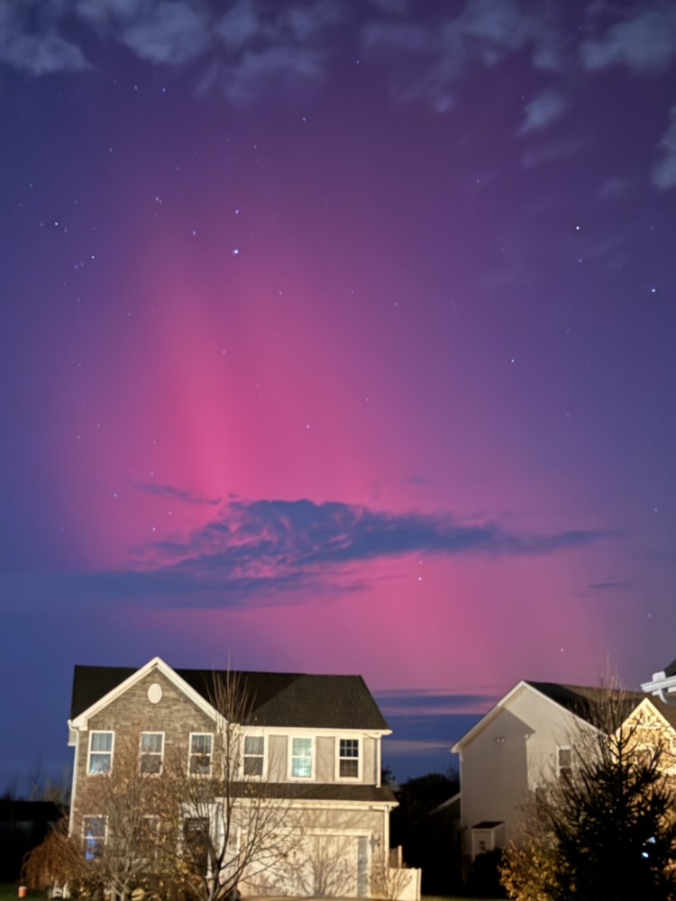 northern lights over house