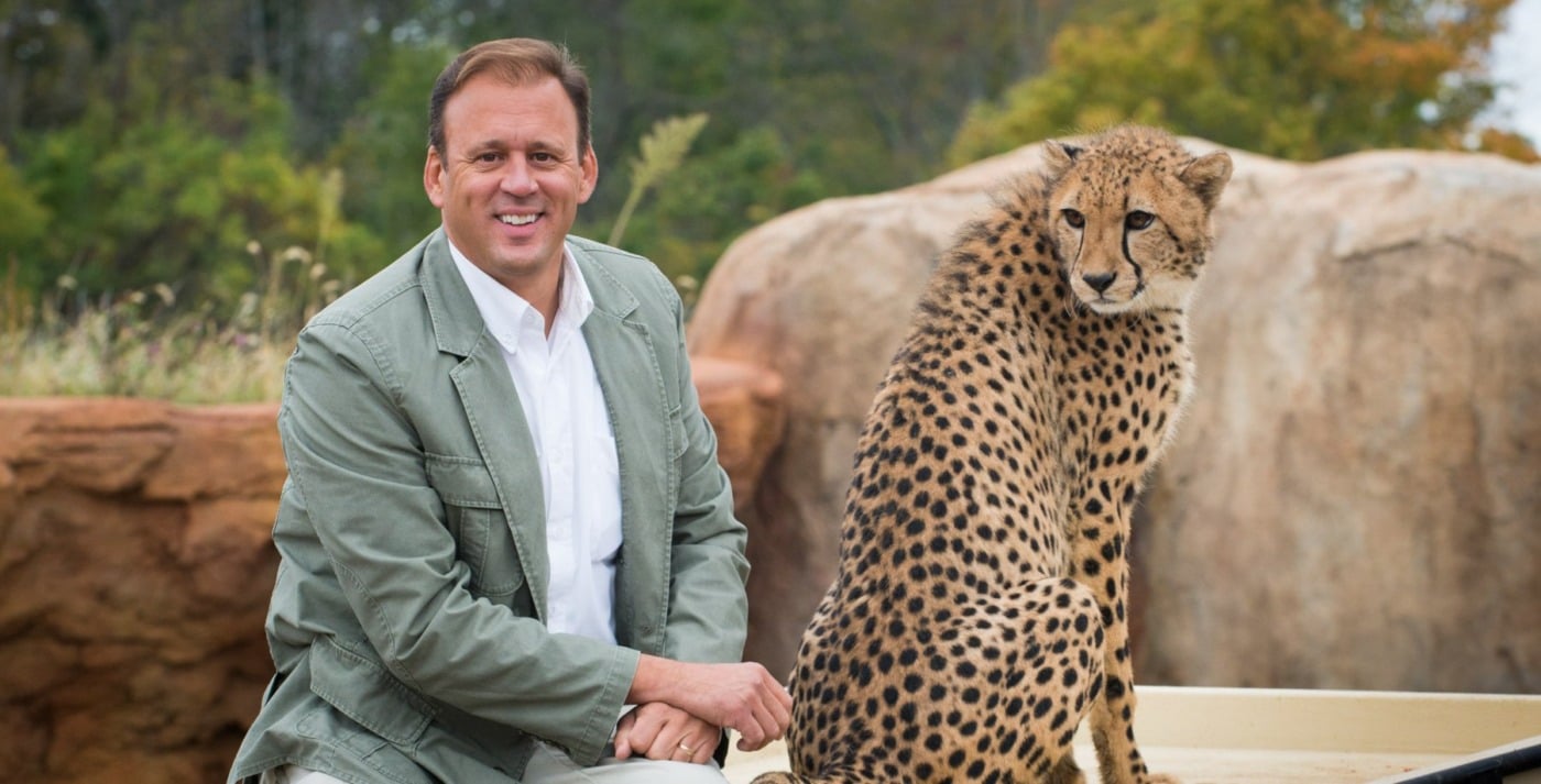 tom stalf posing with cheetah