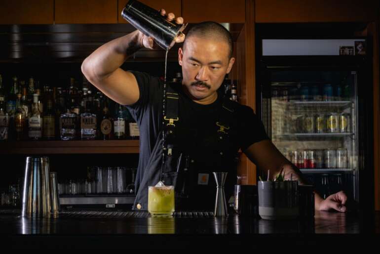 Brewery District Bar Named One Of The Top 5 Best New Bars In The Country 3 bartender pouring drink at Cobra