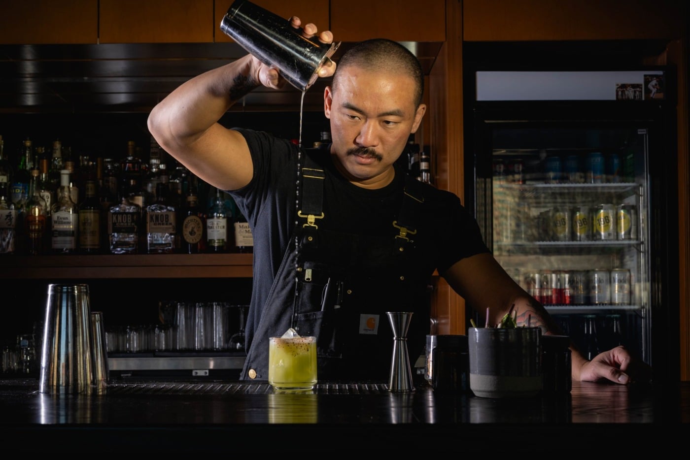 bartender pouring drink at Cobra