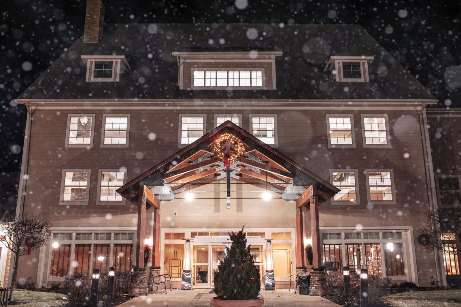snowy lodge decorated for christmas