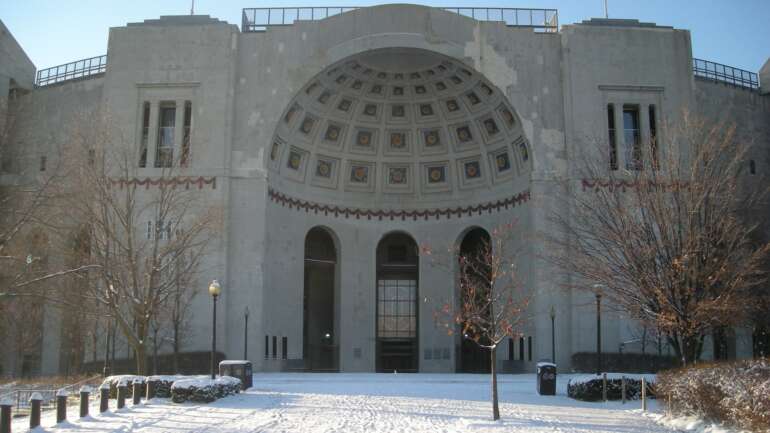 Where To Watch The OSU VS. ❌ichigan Game 2 Snow-covered plaza in front of the Ohio Stadium rotunda