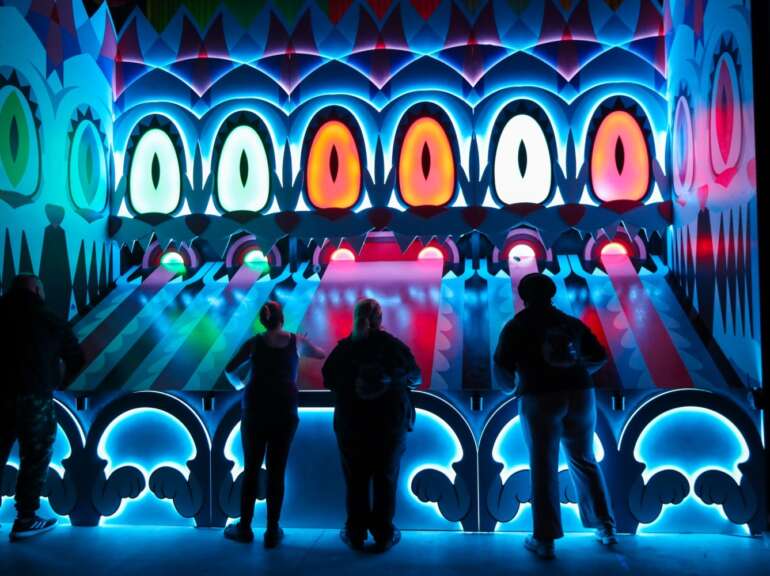 people playing carnival game at gamegrounds