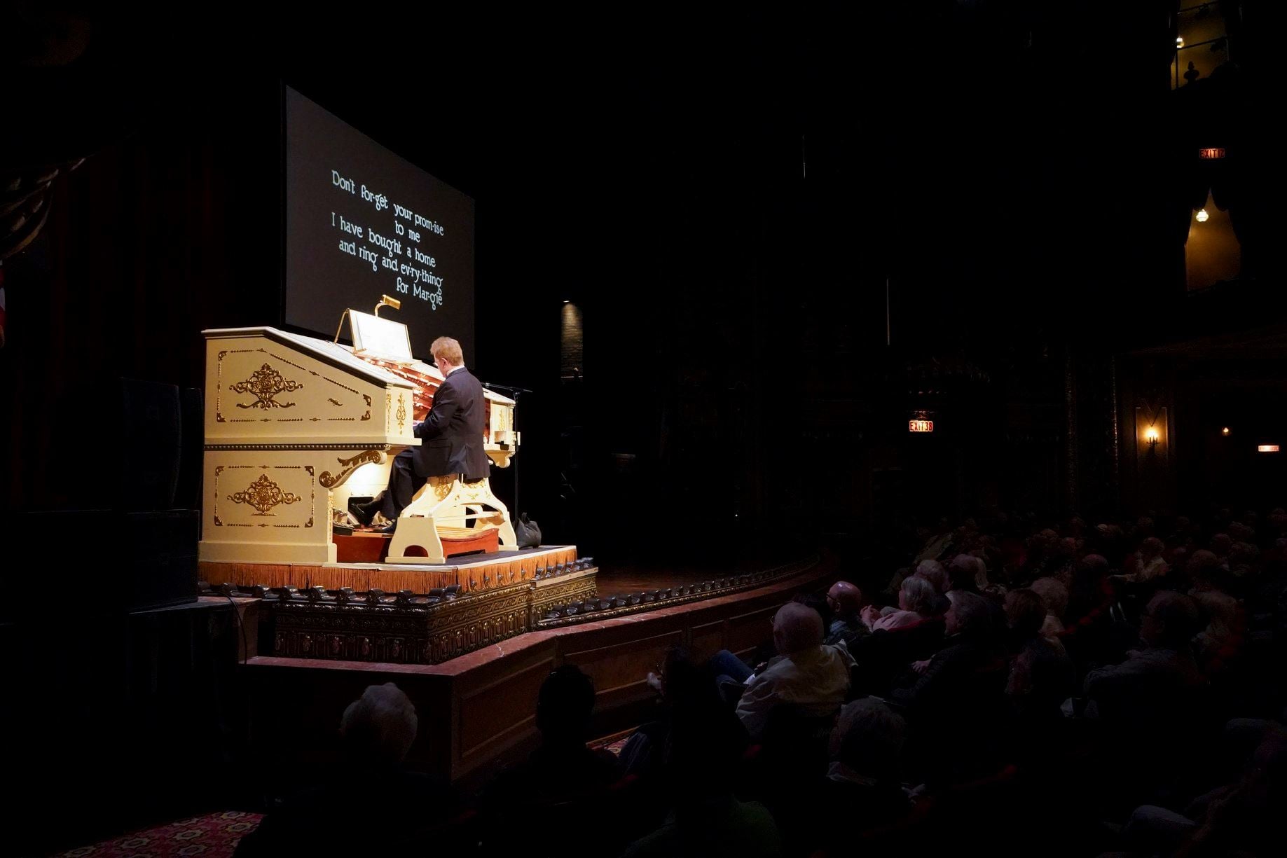 man playing organ