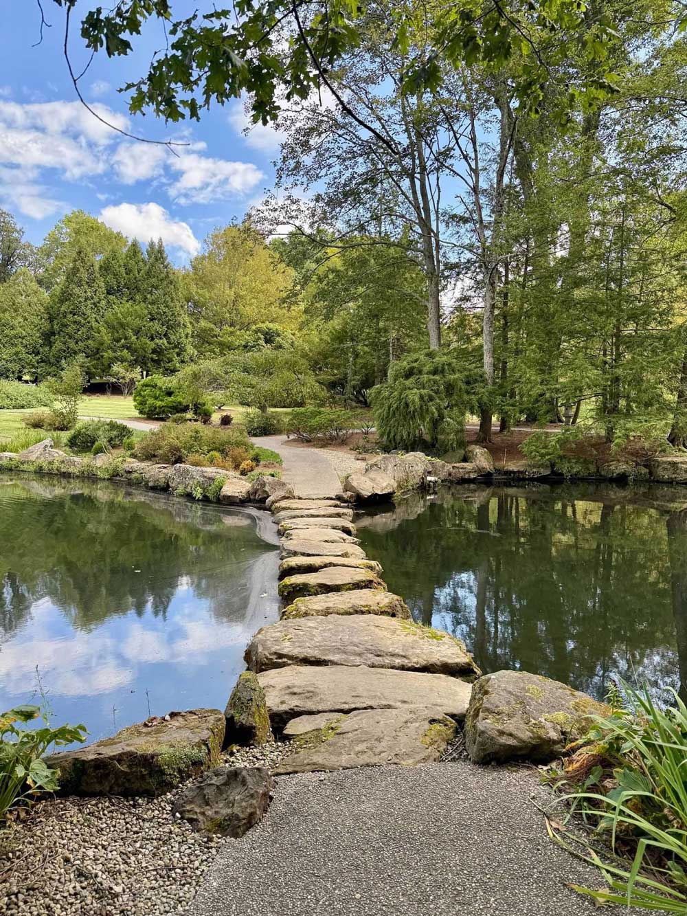 Dawes Arboretum Is The Day Trip For Anyone Looking For A Little Magic In Their Life 3 stone path across water at dawes arboretum