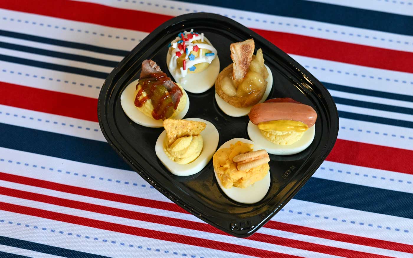 The Ohio State Fair’s New Deviled Egg Flavors Are Absolutely Unhinged 1 six deviled eggs on plate