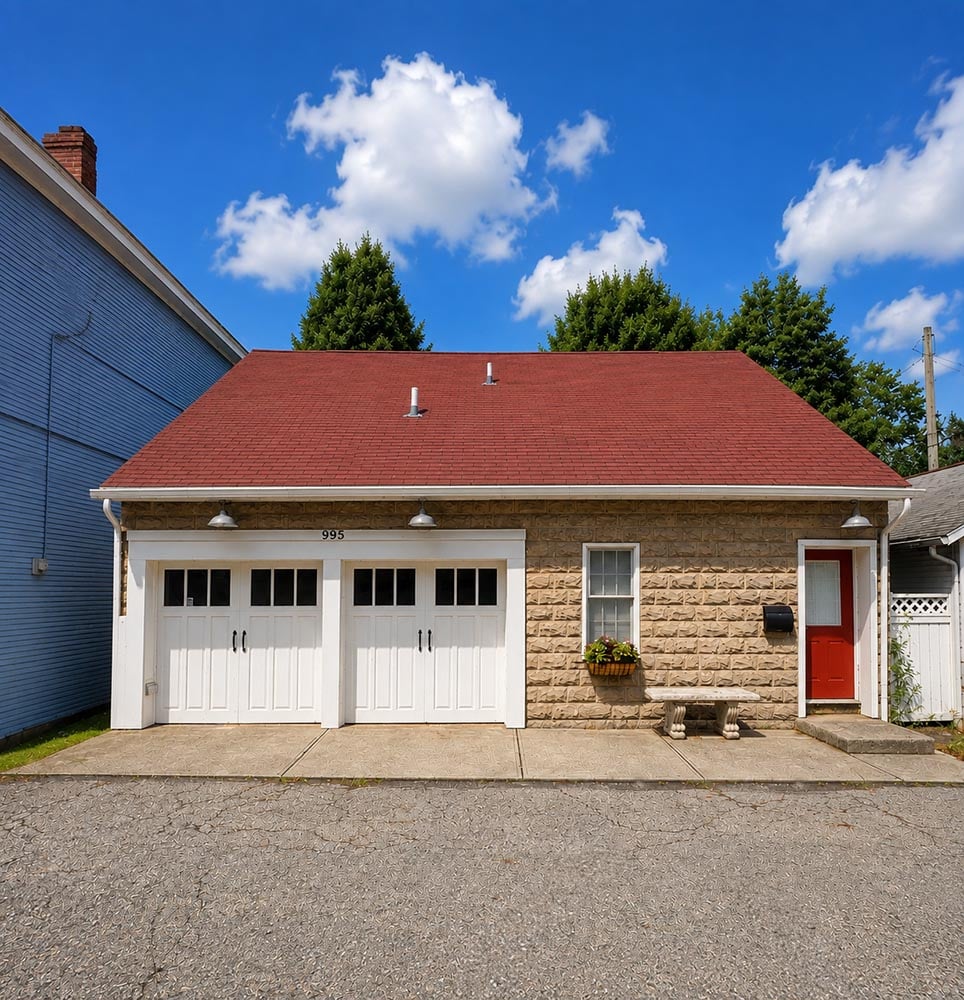 small house with red roof and red front door