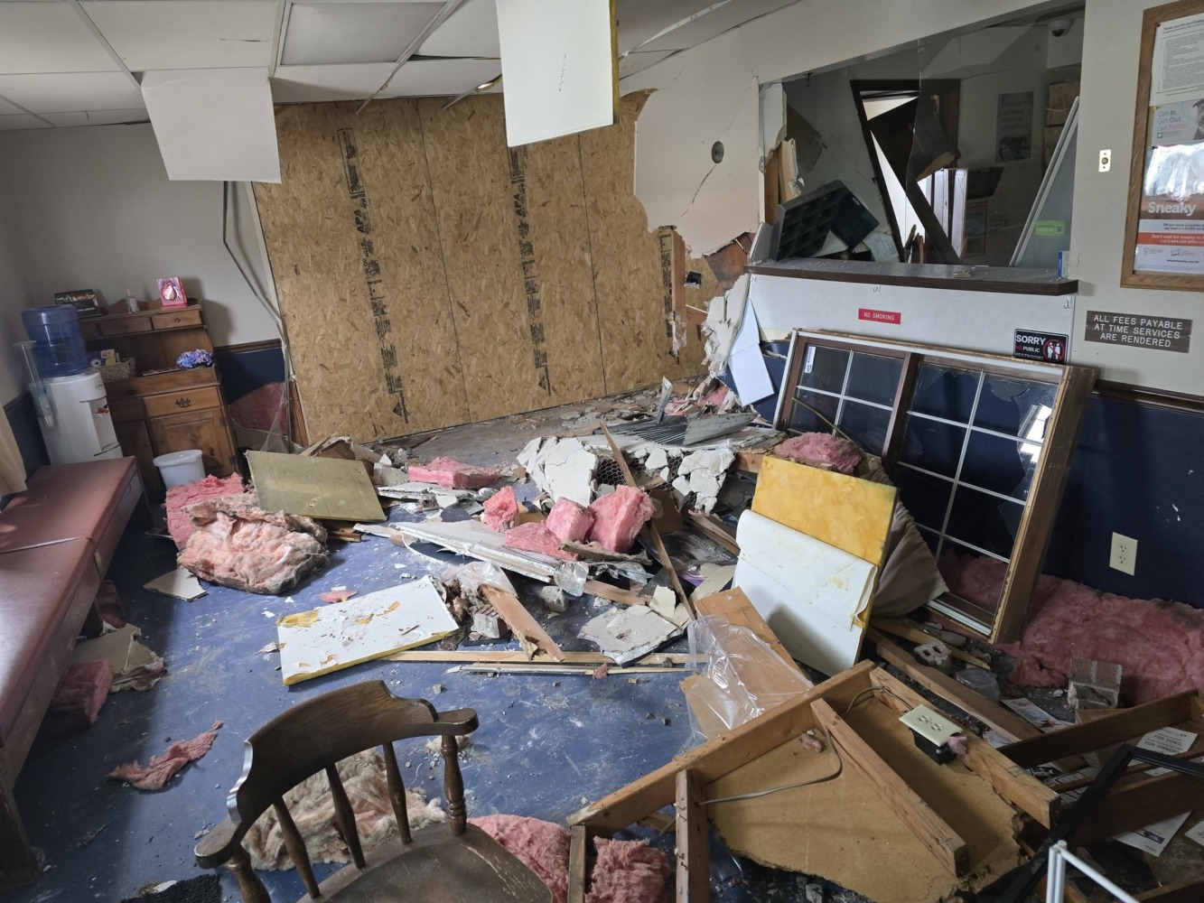 car crash into animal clinic