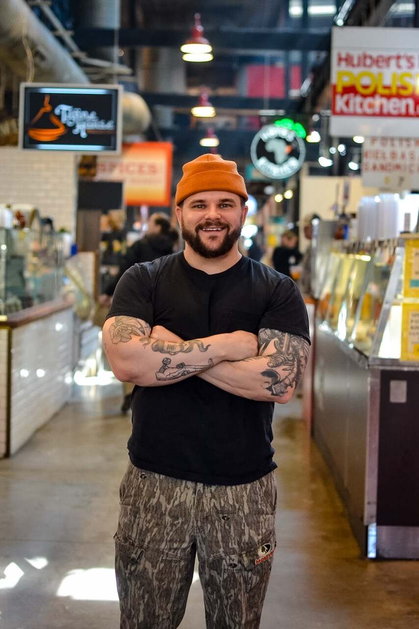 man standing in north market