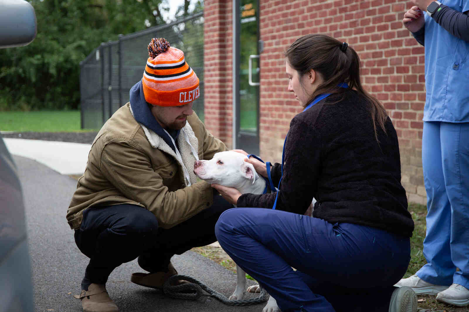 Columbus Humane Expands Free Pet Vaccine Clinics Across The Community 2 dog with vet outside