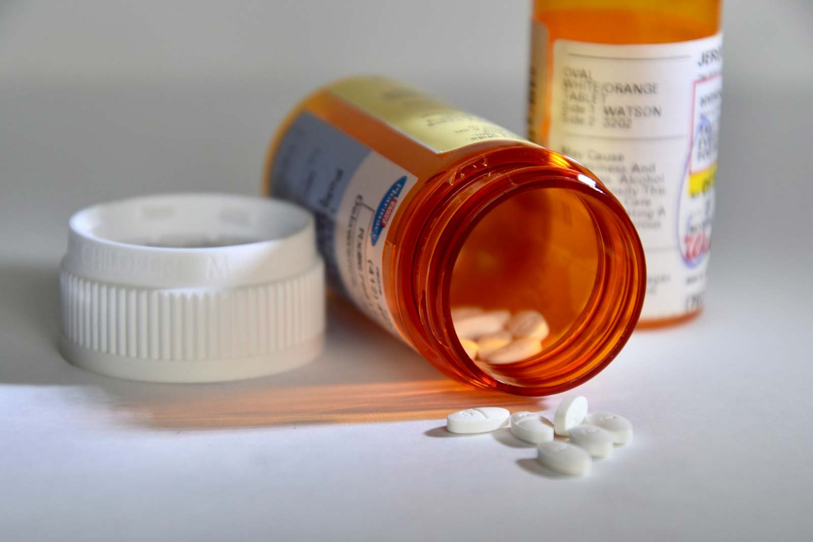 pills falling out of pill bottle
