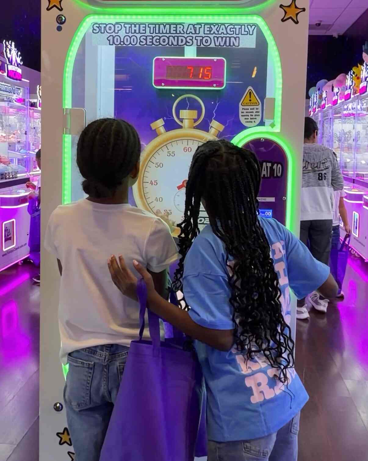 kids playing at arcade