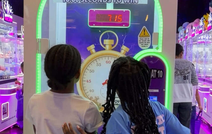 kids playing at arcade