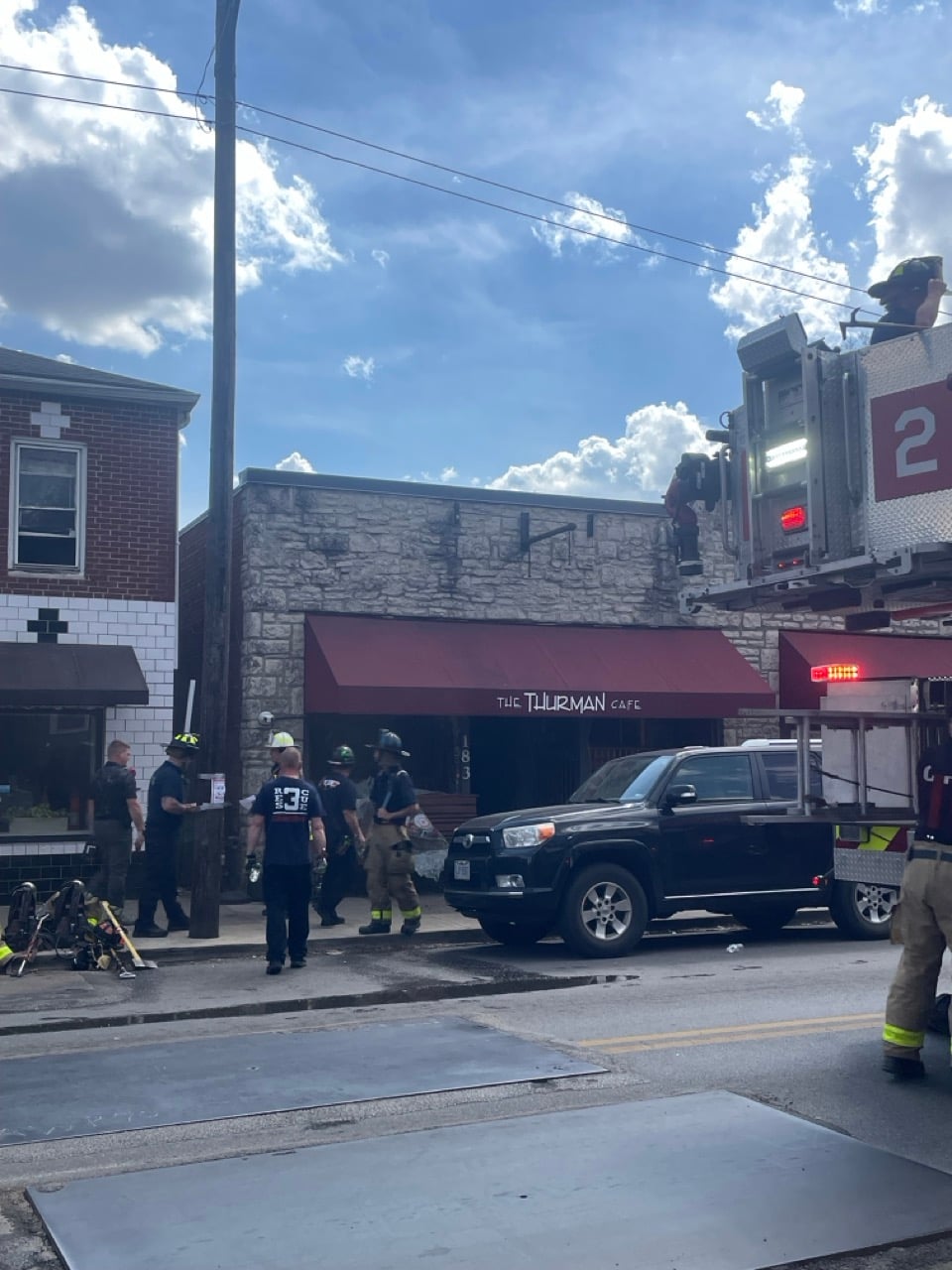 Fire Damages Iconic Thurman Cafe in German Village 1 firefighters assess damage to building