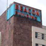 beacon building neon sign