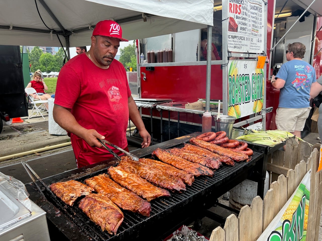 Here’s What’s New at the 2026 Columbus Arts Festival 2 man cooking food on grill