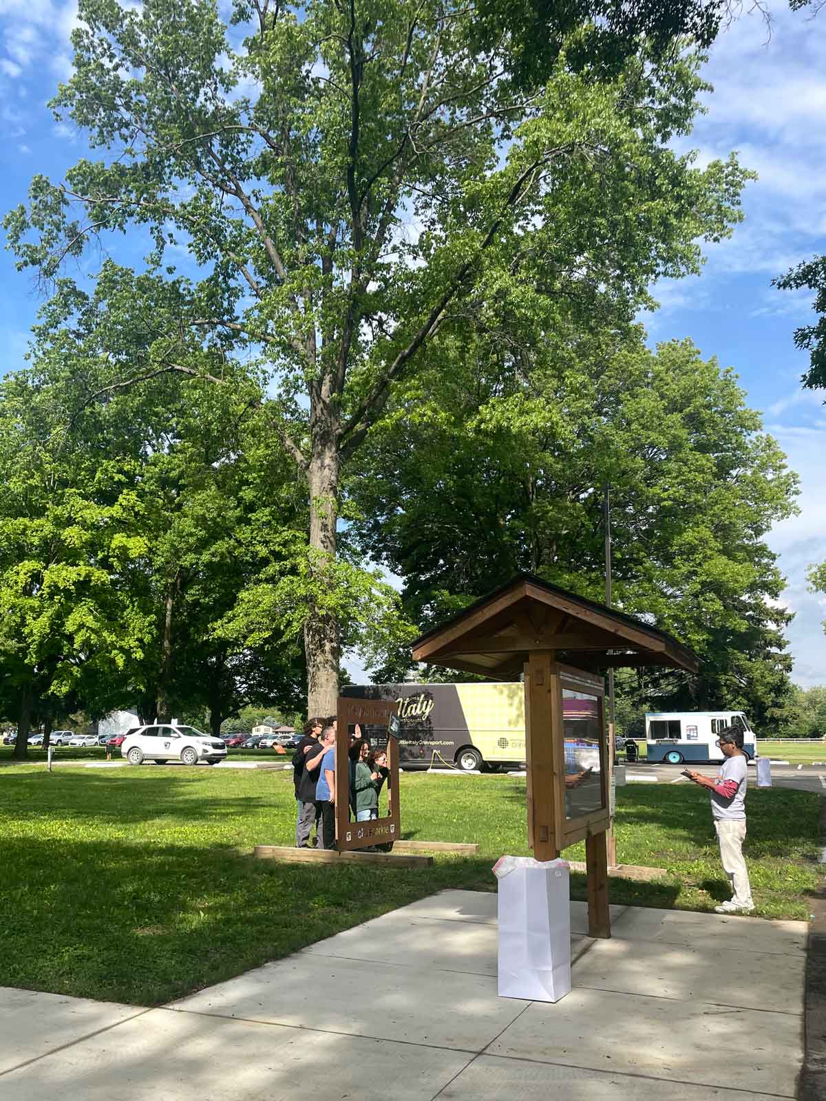 people taking selfie at park