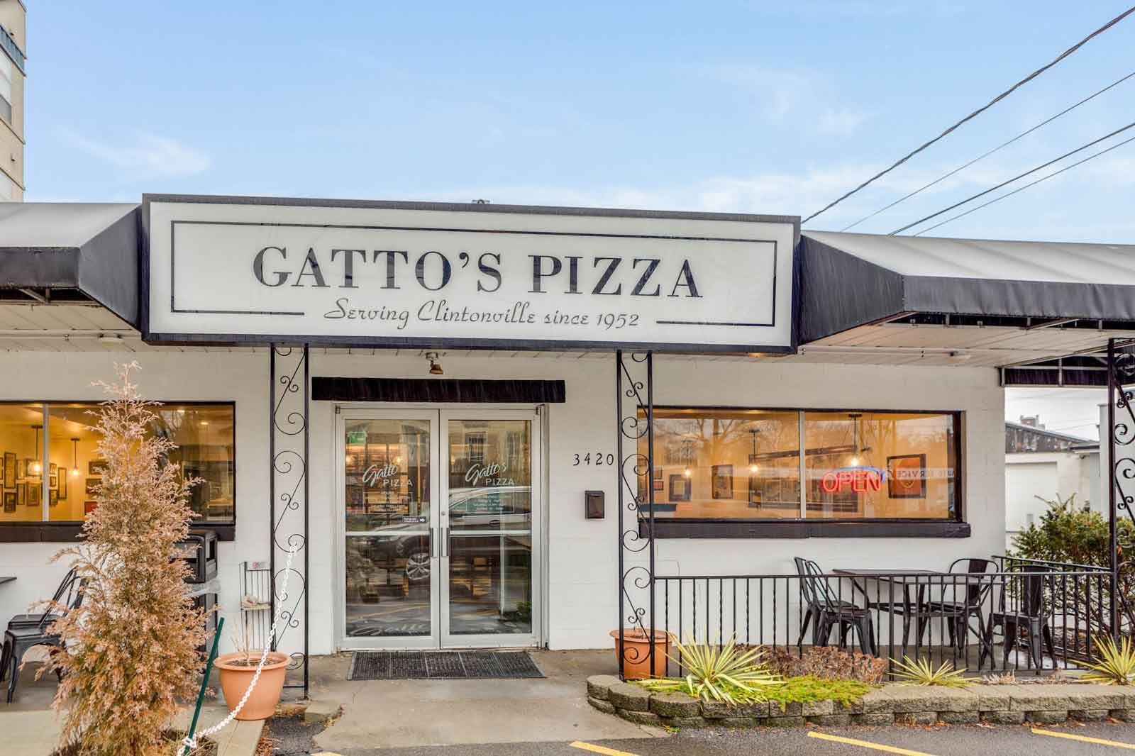 gattos pizza sign on building