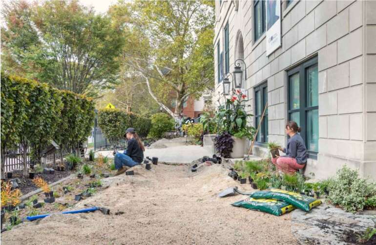 The Pizzuti’s New Garden Project Will Bring 70+ Native Plant Species to Downtown Columbus 4 people working in garden