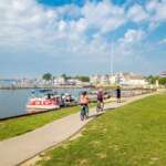 TourismOhio Released Its 2026 Summer Travel Guides And There’s A Lot To Explore people along shorline