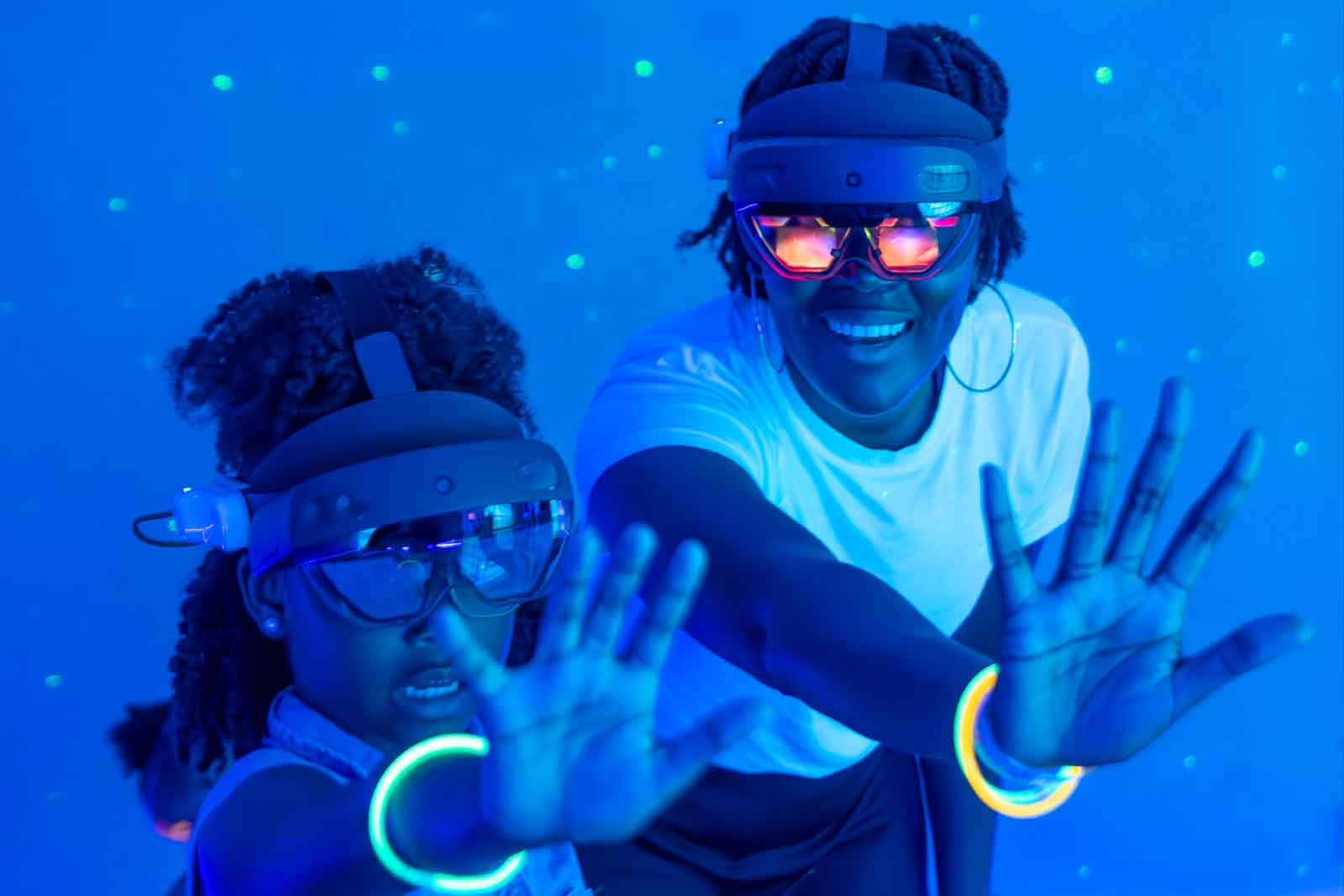 COSI’s New Holographic Theater Lets You Step Inside The Story 1 people using VR headsets