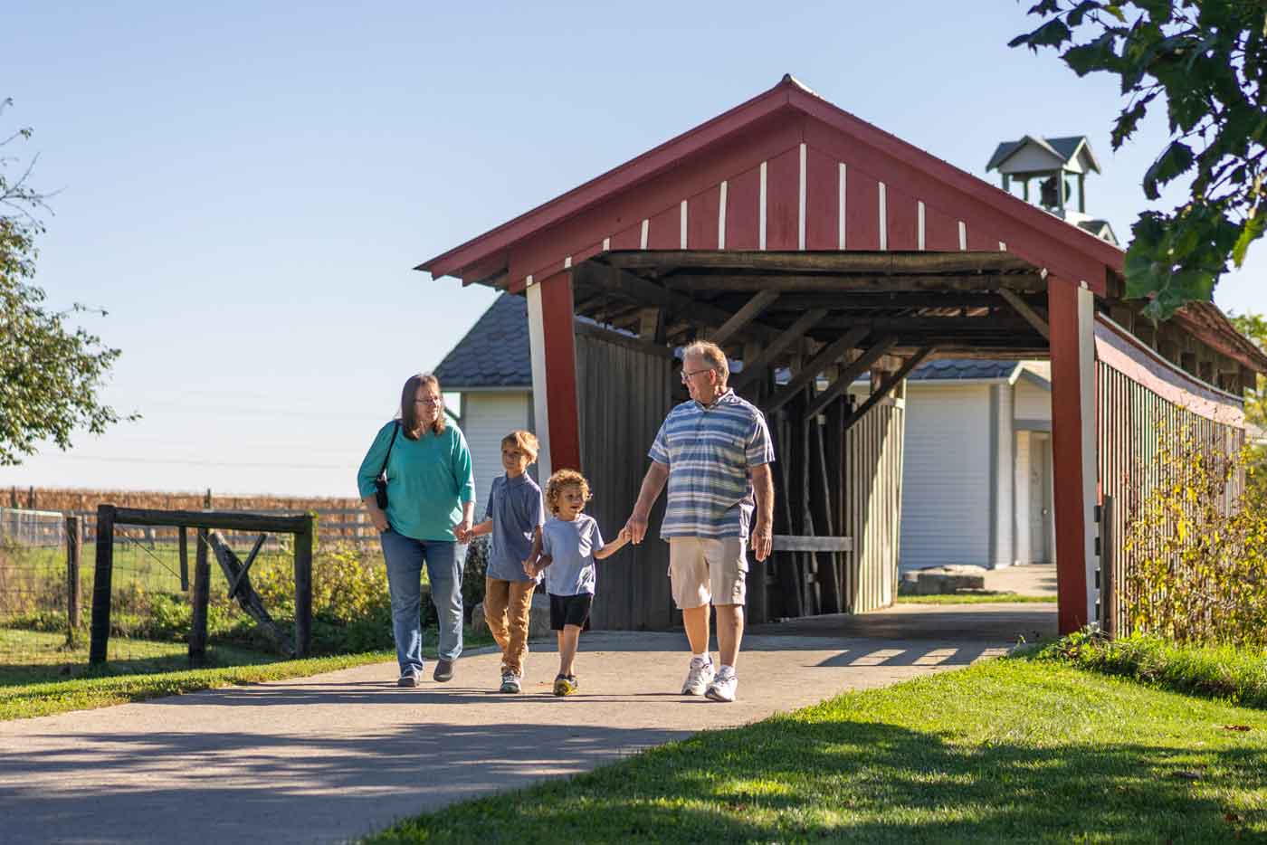 Ohio’s Largest Living History Museum Brings $3 Admission And 1976 Pricing Back For A Day 1 people at covered bridge