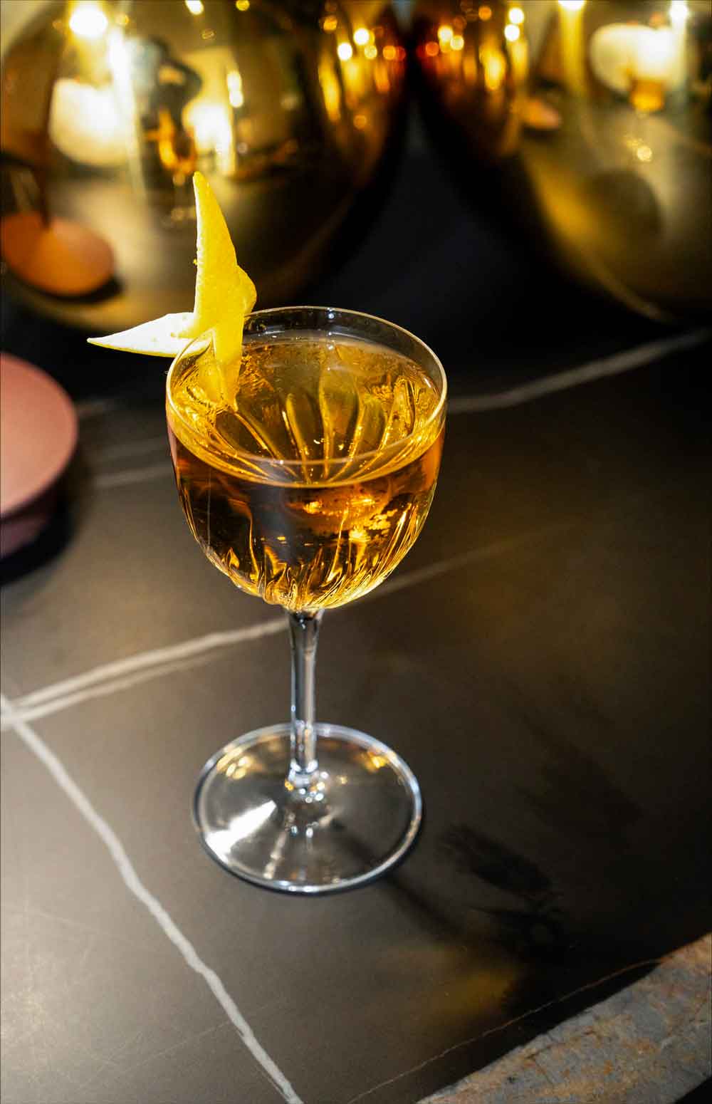Sip Your Way Through Columbus History At This Short North Cocktail Bar 2 a martini in glass
