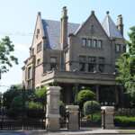 This Stunning 1897 Mansion In Olde Towne East Is Looking For Its Next Chapter 1800s stone mansion with gate